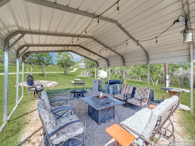 view of patio featuring an outdoor fire pit