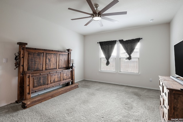 interior space with carpet and ceiling fan