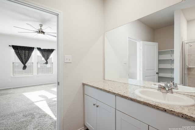 bathroom with vanity and ceiling fan