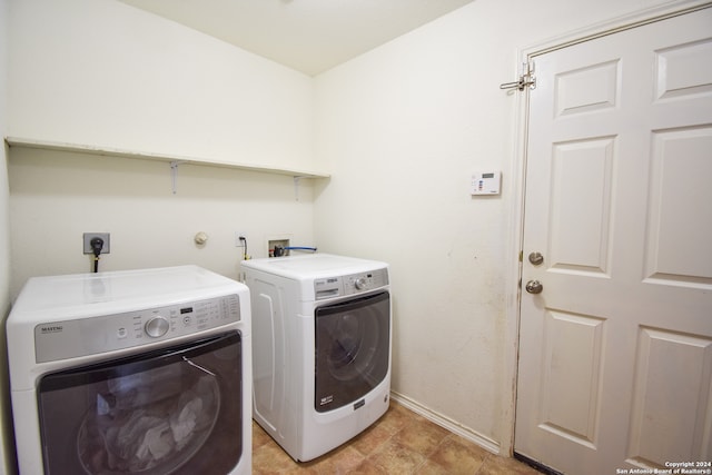 washroom featuring washing machine and dryer