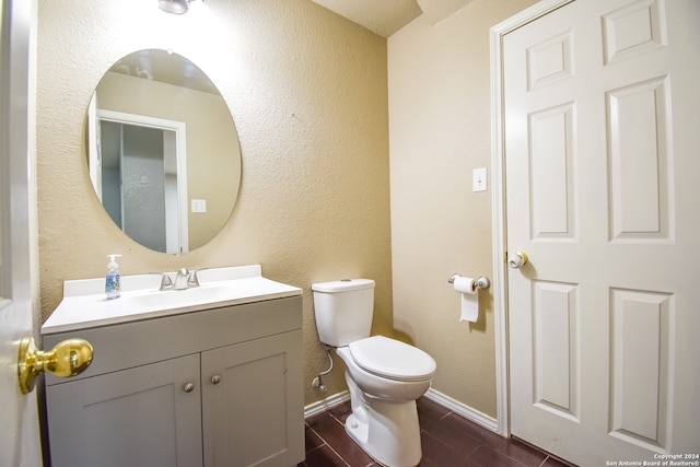 bathroom featuring hardwood / wood-style floors, vanity, and toilet