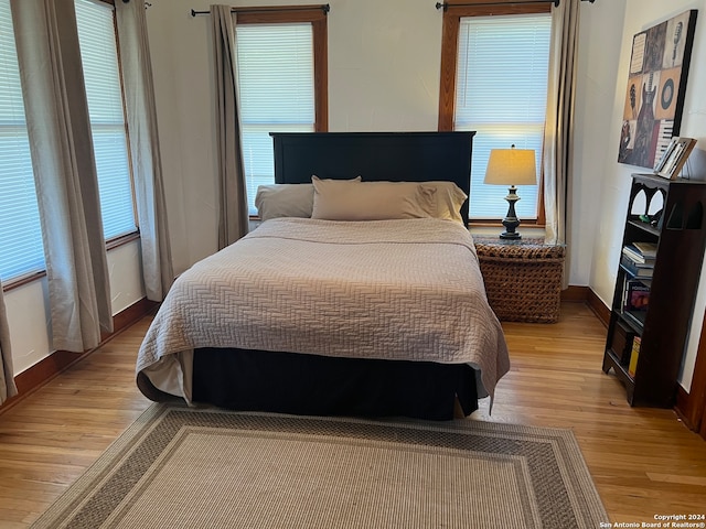 bedroom featuring light wood-type flooring