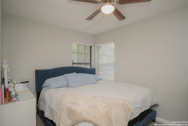 bedroom featuring ceiling fan and carpet floors