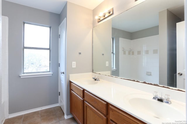 bathroom with vanity and tile patterned floors