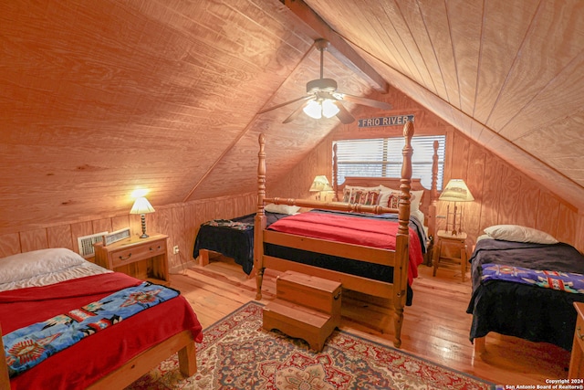 bedroom with ceiling fan, hardwood / wood-style flooring, and wood ceiling