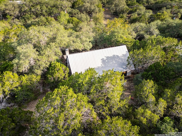 1177 River Rd, Concan, TX 78801 - view from above of property featuring a heavily wooded area