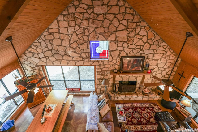 unfurnished living room featuring wood ceiling and a healthy amount of sunlight