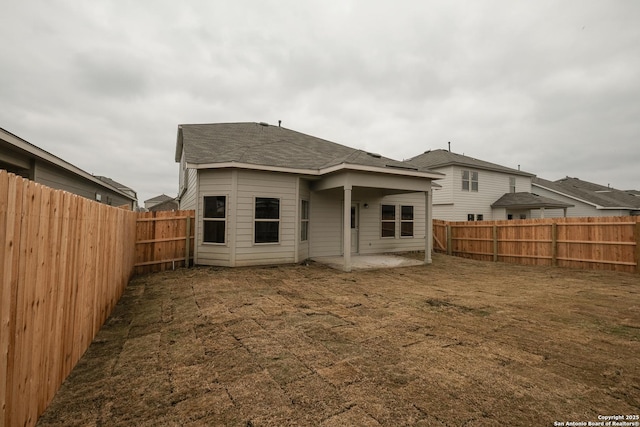 back of property featuring a patio area