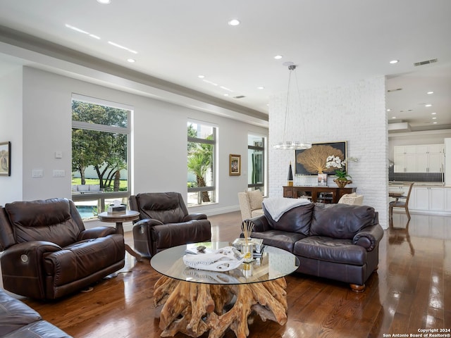 living room featuring dark wood-type flooring