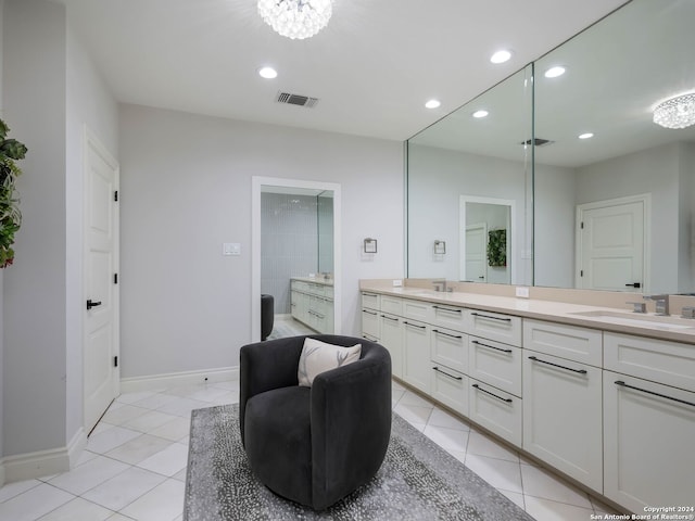 bathroom with vanity and tile patterned floors