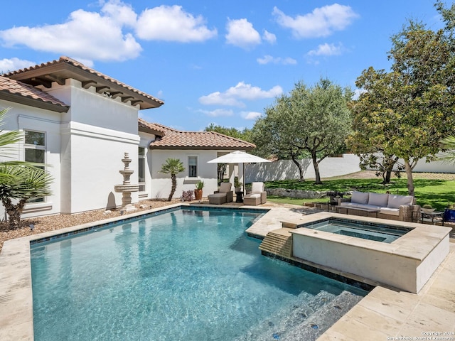 view of swimming pool with an outdoor hangout area and an in ground hot tub