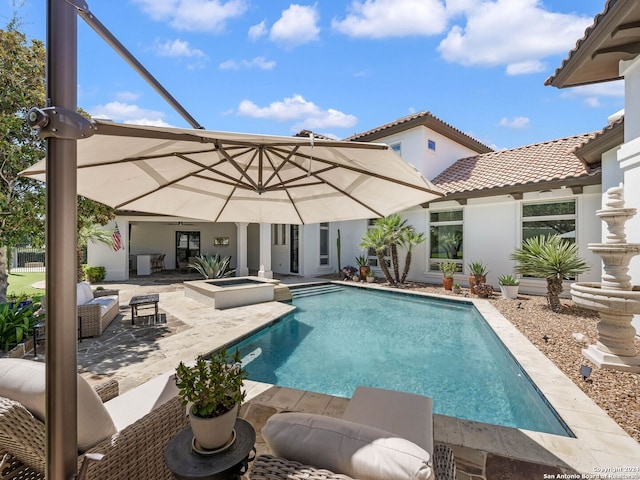 view of pool with an outdoor hangout area and a patio area