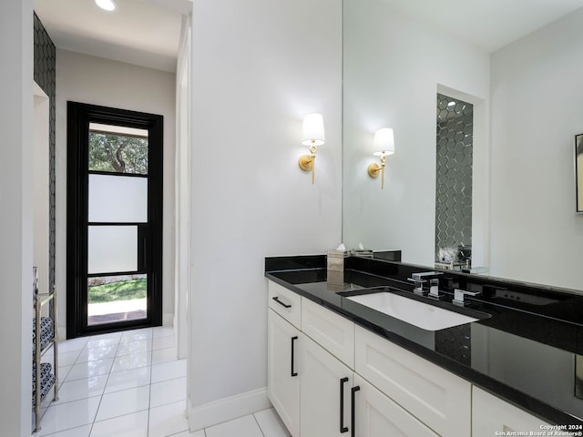 bathroom with vanity and tile patterned floors