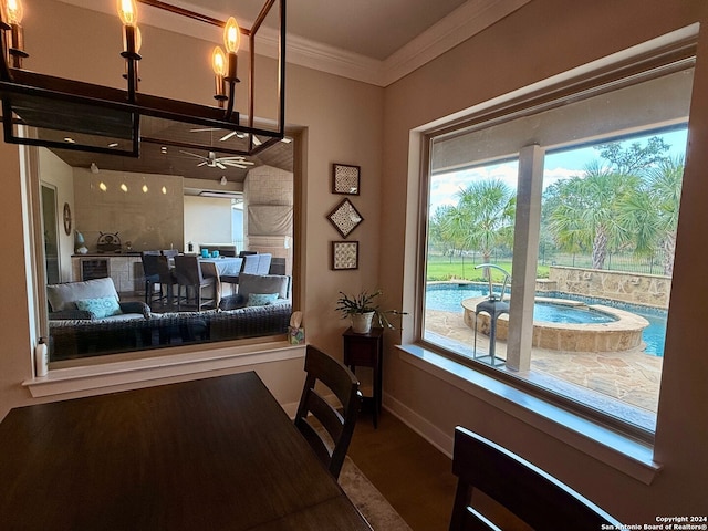 dining area featuring ornamental molding