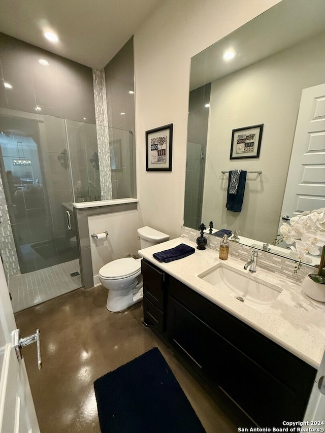 bathroom featuring vanity, toilet, concrete flooring, and an enclosed shower