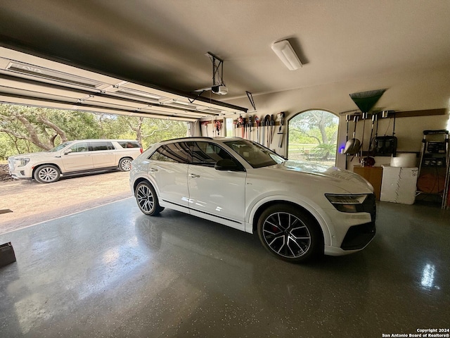 garage featuring a garage door opener