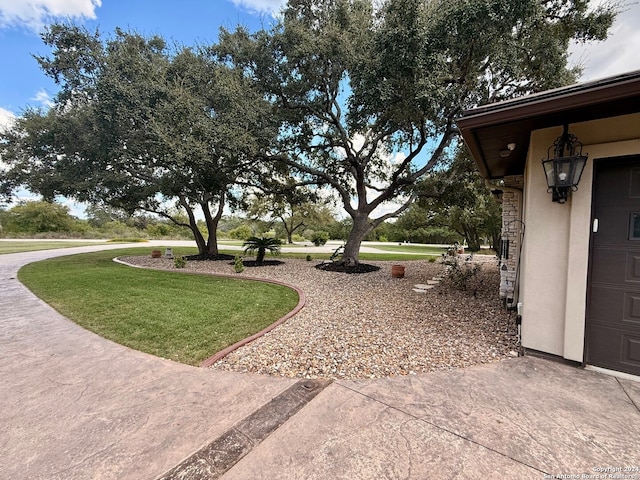 view of yard with a garage