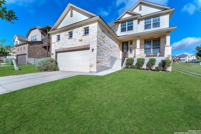 view of front of house with covered porch, a garage, and a front yard