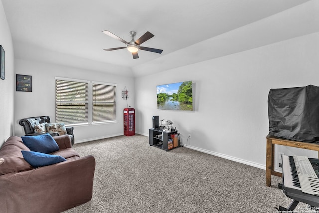 carpeted living room with ceiling fan