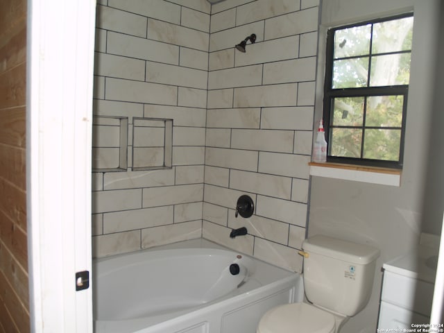 bathroom featuring a bathing tub and toilet