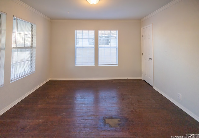 unfurnished room with dark hardwood / wood-style floors and crown molding