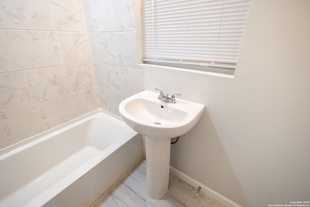 bathroom featuring a bathtub