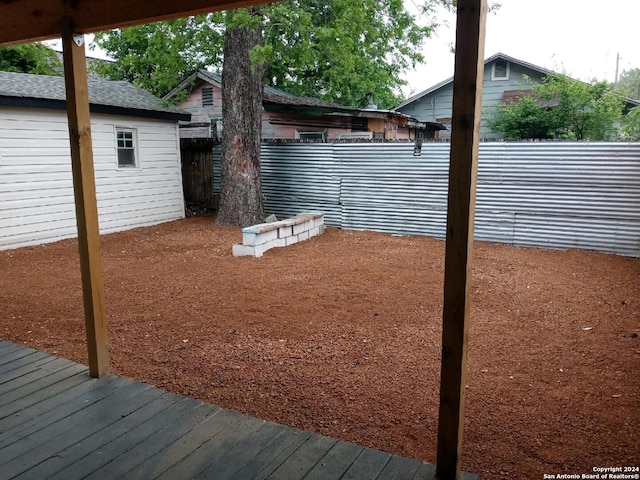 view of yard featuring a wooden deck