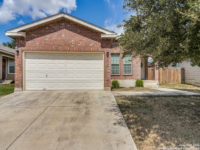 single story home with a garage