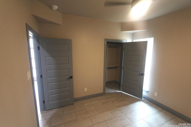 unfurnished bedroom featuring a closet