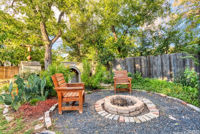 exterior space with a fire pit