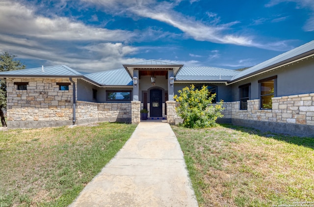 exterior space featuring a front yard