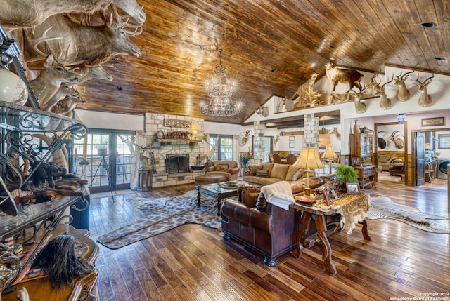 living room featuring a chandelier, a fireplace, high vaulted ceiling, hardwood / wood-style floors, and wooden ceiling