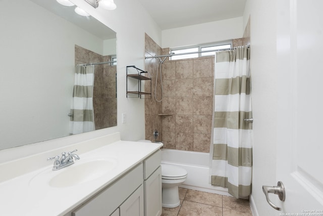 full bathroom featuring shower / tub combo with curtain, vanity, toilet, and tile patterned floors