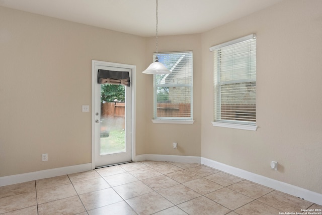 interior space featuring light tile patterned floors