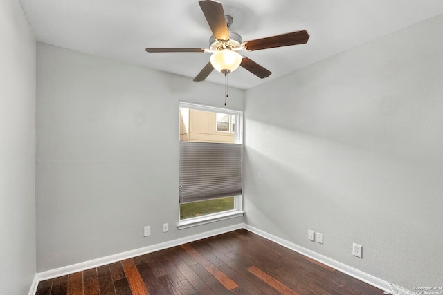 empty room with ceiling fan and hardwood / wood-style floors