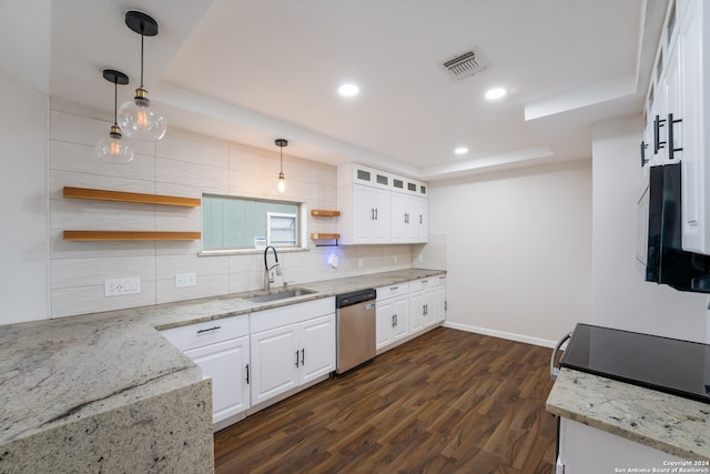 kitchen featuring light stone countertops, dishwasher, and white cabinetry