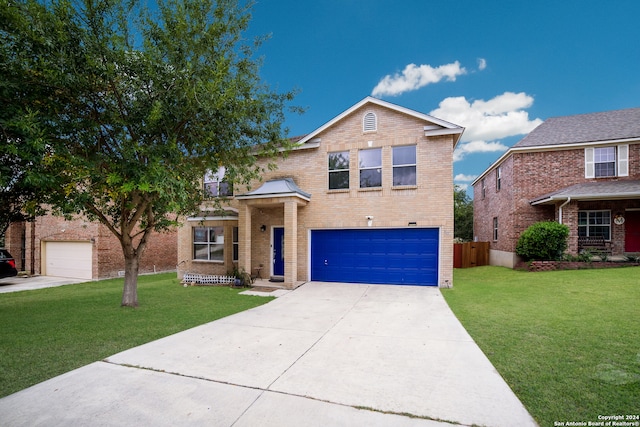 view of front facade featuring a garage and a front lawn