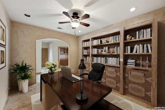 office space featuring ceiling fan