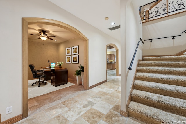 entryway with ceiling fan