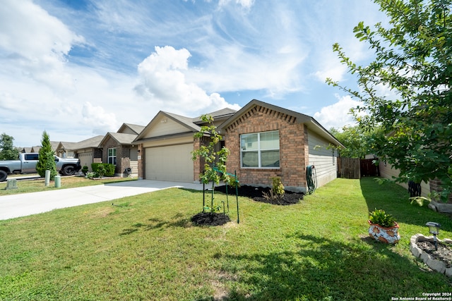 view of front of house featuring a garage and a front lawn