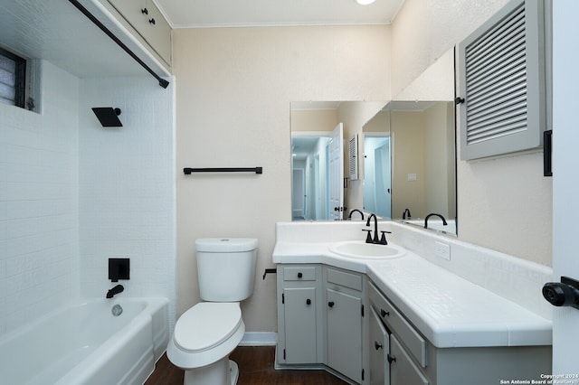 full bathroom with vanity, toilet, and tiled shower / bath