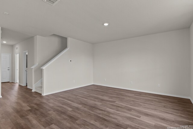 empty room featuring hardwood / wood-style flooring