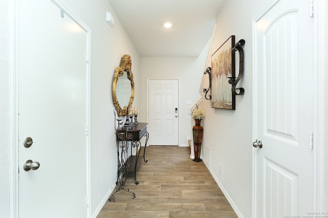 hallway with light wood-type flooring