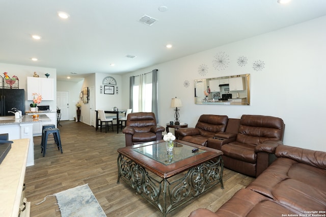 living room with wood-type flooring