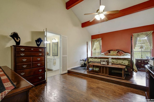 bedroom with lofted ceiling with beams, connected bathroom, ceiling fan, and dark hardwood / wood-style flooring