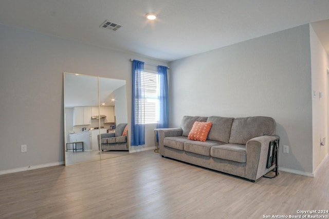 living room featuring light hardwood / wood-style floors