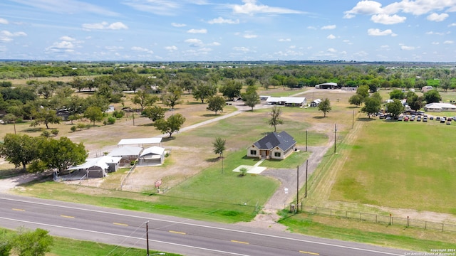 birds eye view of property featuring a rural view