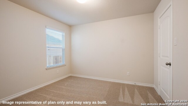 view of carpeted empty room