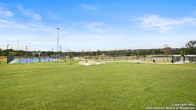 view of community featuring a lawn