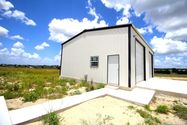 view of outdoor structure featuring a garage